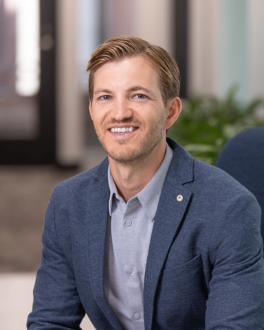 portrait of a smiling person in professional attire